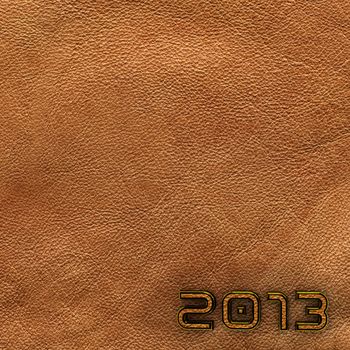 Leather background with 2013 new year label. Square. Brown.