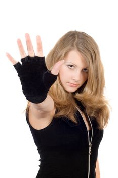 Young girl with hand stop sign. Focus on a face