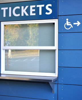 Tickets sell window with disable access sign