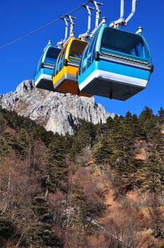 Group of  cable car cabins in blue moon valley Shangrila China