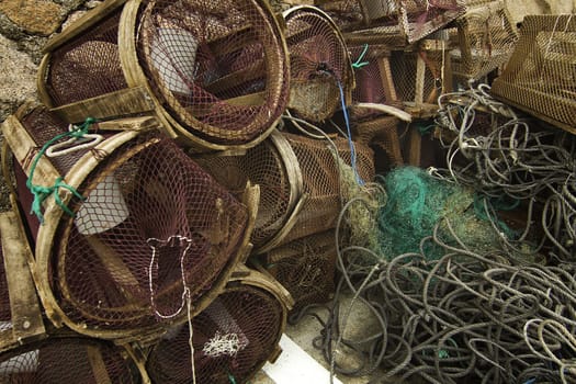 Creels and net in the port of Pindo, Galicia, Spain