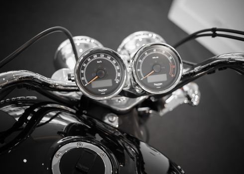 BANGKOK - SEPTEMBER 22: Triumph speedometer gauges on display at the Promenade Bigbike Show on September 22, 2012 in Bangkok, Thailand