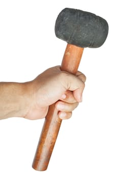 hand with old rubber mallet on white background