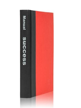 success business manual and red cover book with black strap