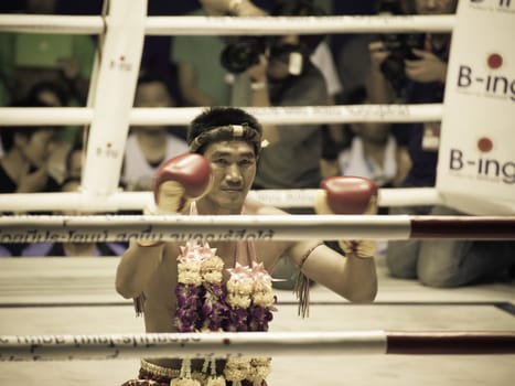 BANGKOK, THAILAND- OCTOBER 04 : Unidentified boxers compete in Thai Fight: Muay Thai Charity on October 04, 2012 at Rajadamnern Stadium in Bangkok, Thailand