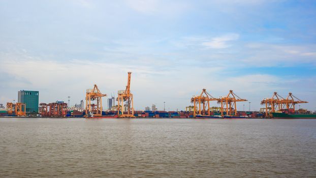 Logistic concept, container cargo ship transport import export in harbor and crane