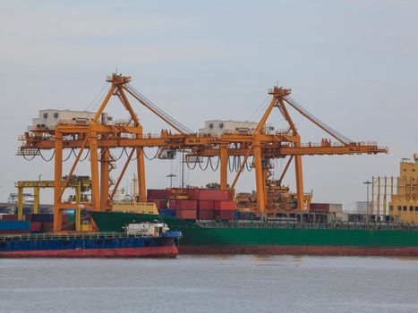 Logistic concept, container cargo ship transport import export in harbor and crane