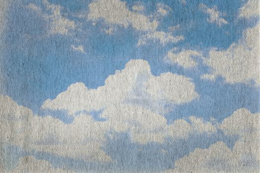 Cloudy blue sky on old paper texture