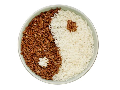 Black and white rice forming a yin yang symbol
