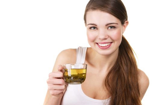 Young beautiful woman with a cup of green tea, white background