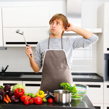 Man cooking in modern kitchen