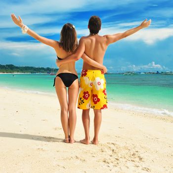 Beautiful couple on a tropical beach