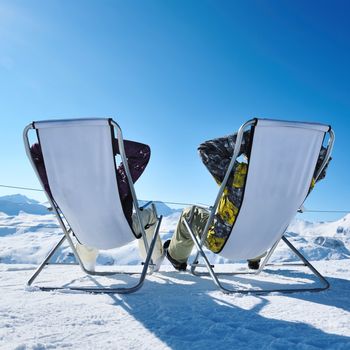 Couple at mountains in winter, Val-d'Isere, Alps, France