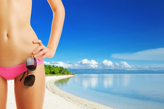 Woman with beautiful body wearing sunglasses at tropical beach. Collage.