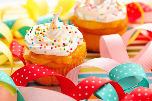 Cupcakes with whipped cream and icing