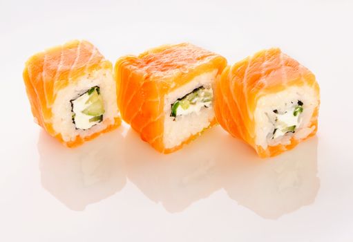 Sushi rolls over grey background