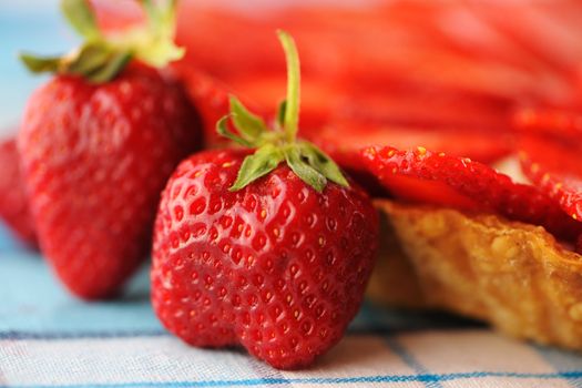 Homemade strawberry tart on table