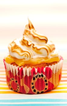 Cupcake with whipped cream and icing