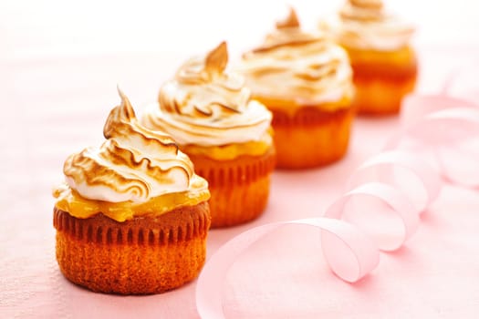 Cupcakes with whipped cream and icing
