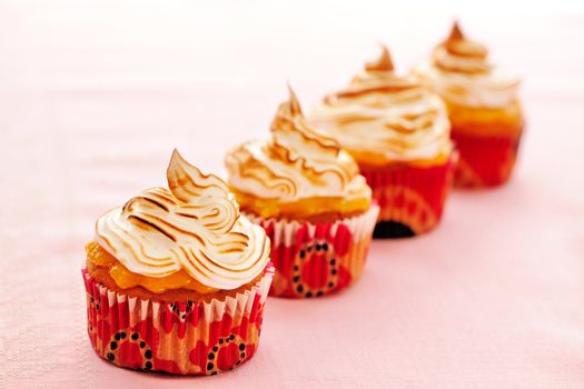 Cupcakes with whipped cream and icing