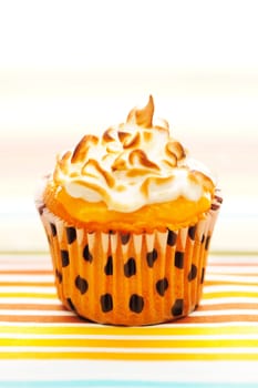 Cupcake with whipped cream and icing