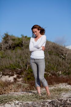 beautiful woman relax in summer outdoor in wind dune beach lifestyle