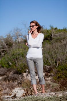 beautiful woman relax in summer outdoor in wind dune beach lifestyle