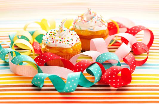 Cupcakes with whipped cream and icing