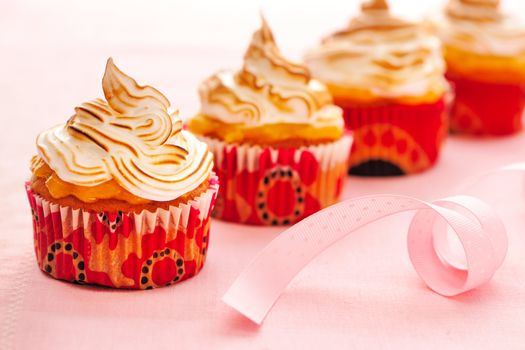 Cupcakes with whipped cream and icing