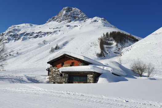 Mountain ski resort with snow in winter, Val-d'Isere, Alps, France