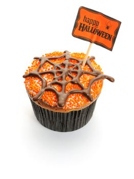 Halloween cupcake with decoration isolated on white