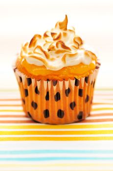 Cupcake with whipped cream and icing