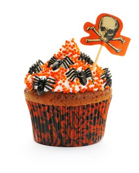 Halloween cupcake with decoration isolated on white