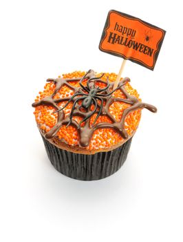 Halloween cupcake with decoration isolated on white