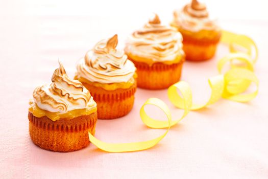 Cupcakes with whipped cream and icing