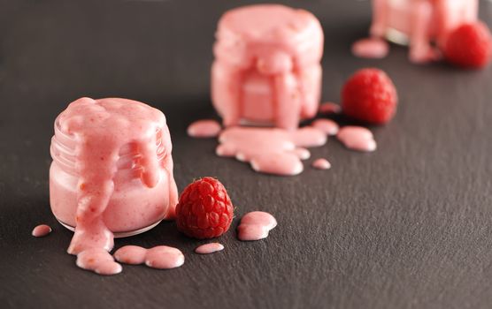 Fresh yogurt with raspberries