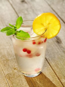 Fresh lemonade on wooden table