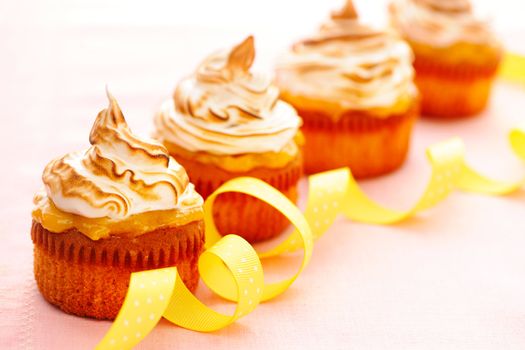 Cupcakes with whipped cream and icing