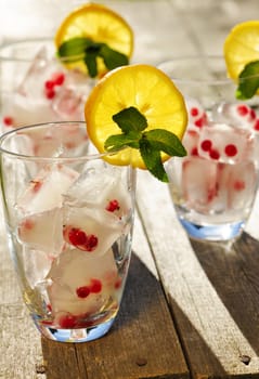 Fresh lemonade on wooden table