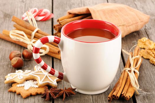 Mug of hot chocolate on wooden table