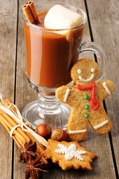 Glass of hot chocolate on wooden table