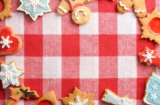 Christmas gingerbread cookies over tablecloth