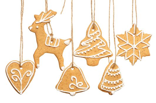 Christmas homemade gingerbread cookies over white