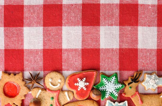 Christmas gingerbread cookies over tablecloth