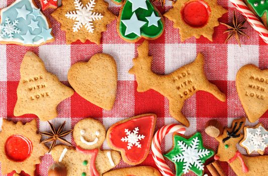 Christmas gingerbread cookies over tablecloth