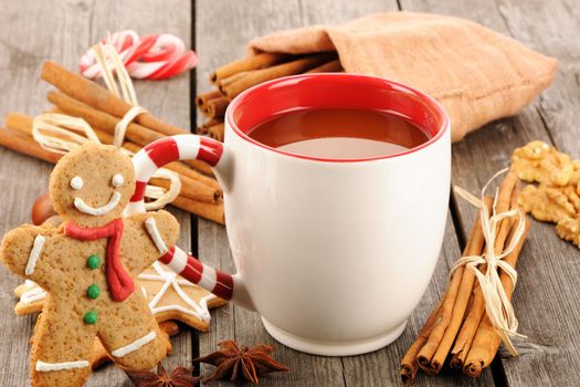 Mug of hot chocolate on wooden table