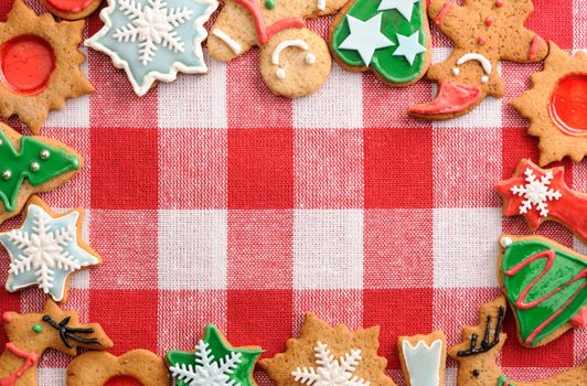 Christmas gingerbread cookies over tablecloth