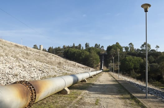 Steel water pipeline in Vigia dam supplying drinking water to the county of Redondo, Alentejo, Portugal