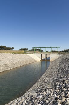 Almost finished sluice gate in the water diversion canal upstream the Alvito reservoir near Oriola village, part of the Alqueva Irrigation Plan, Alentejo, Portugal