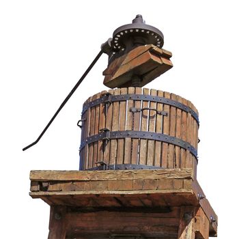 Routed photograph of a press with grapes for the grape harvest